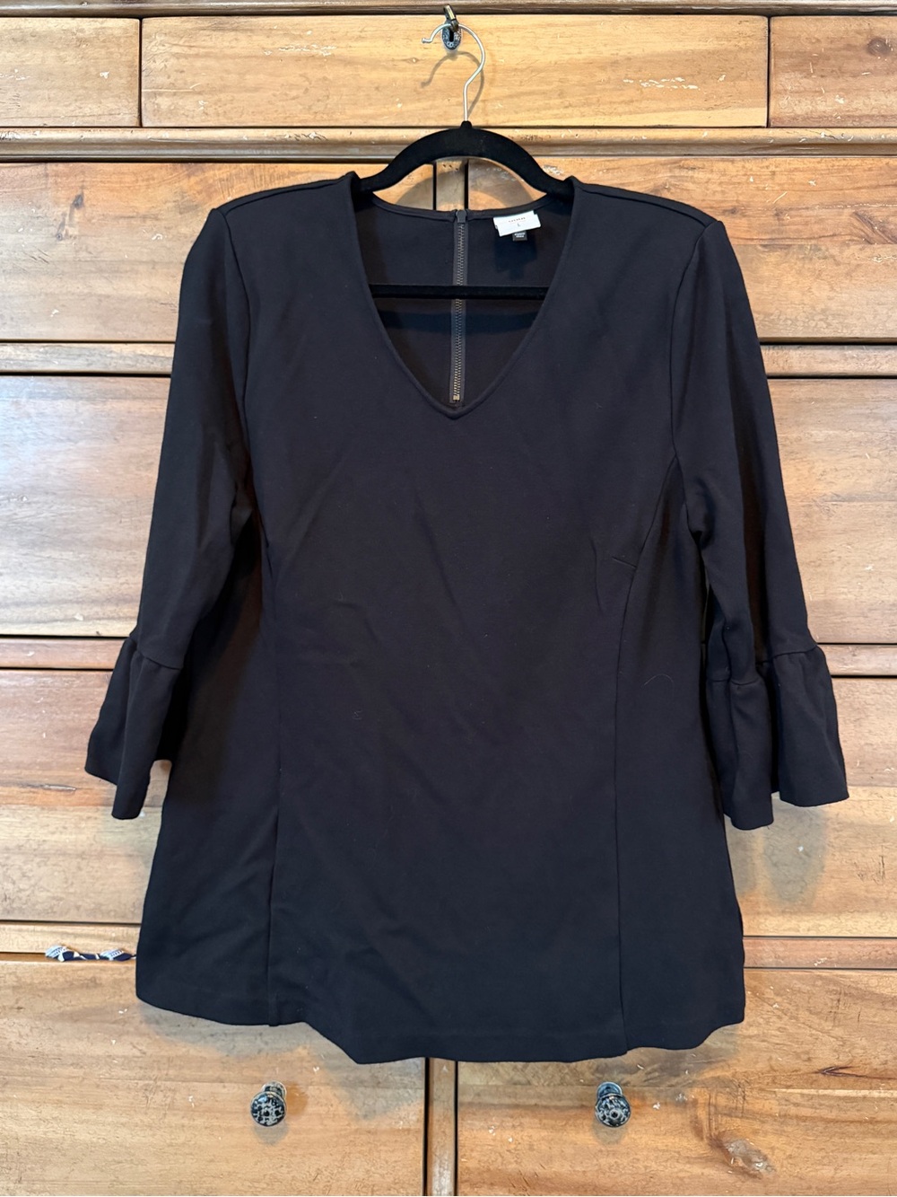 CAbi Black Top with Subtle V-Neck and 3/4 Bell Sleeves
